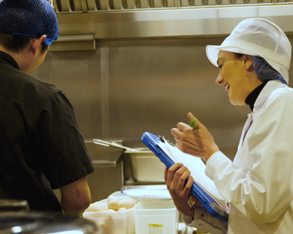 EHO talking with chef about allergen management 